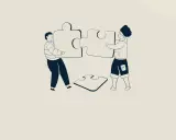 Twee personen leggen puzzelstukken bij elkaar, symbool voor gedeeld leiderschap in het onderwijs.