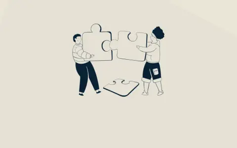 Twee personen leggen puzzelstukken bij elkaar, symbool voor gedeeld leiderschap in het onderwijs.