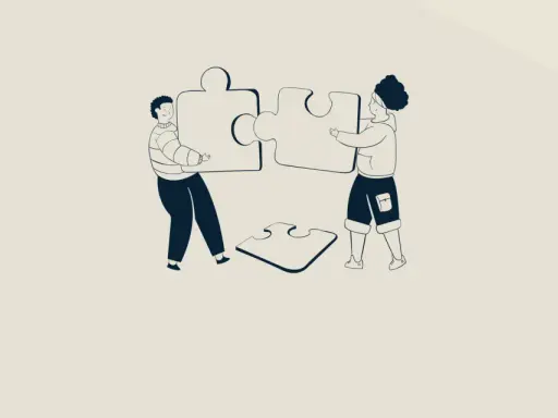 Twee personen leggen puzzelstukken bij elkaar, symbool voor gedeeld leiderschap in het onderwijs.